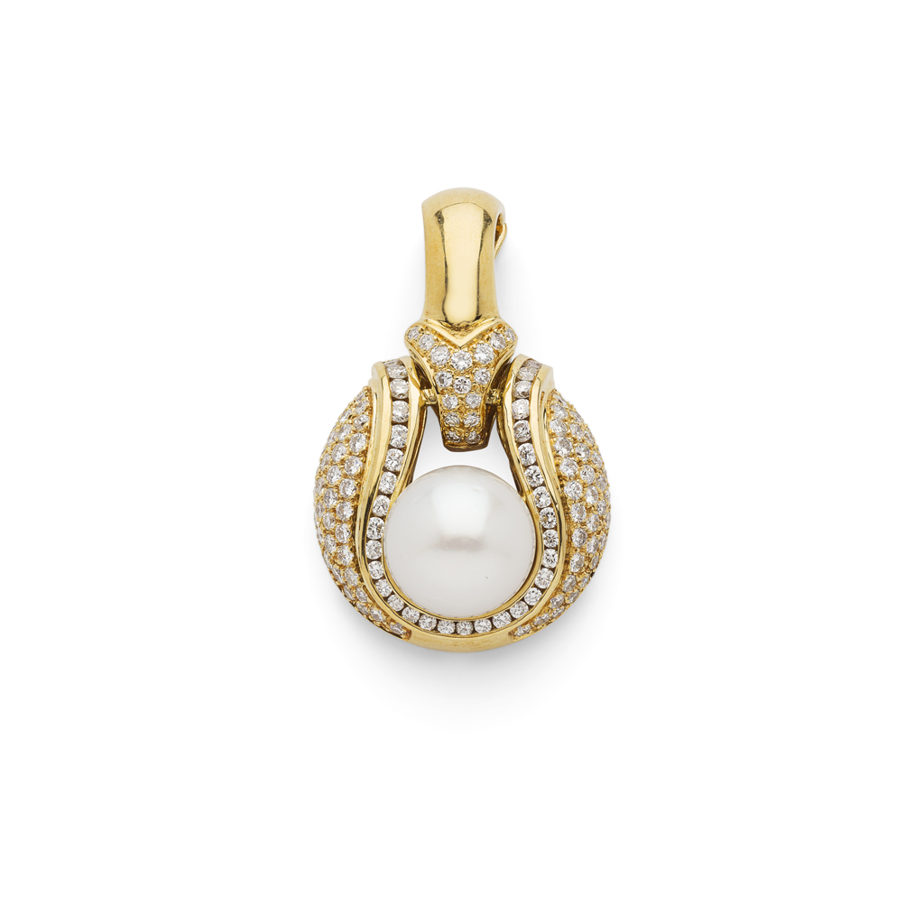 A diamond and pearl set pendant