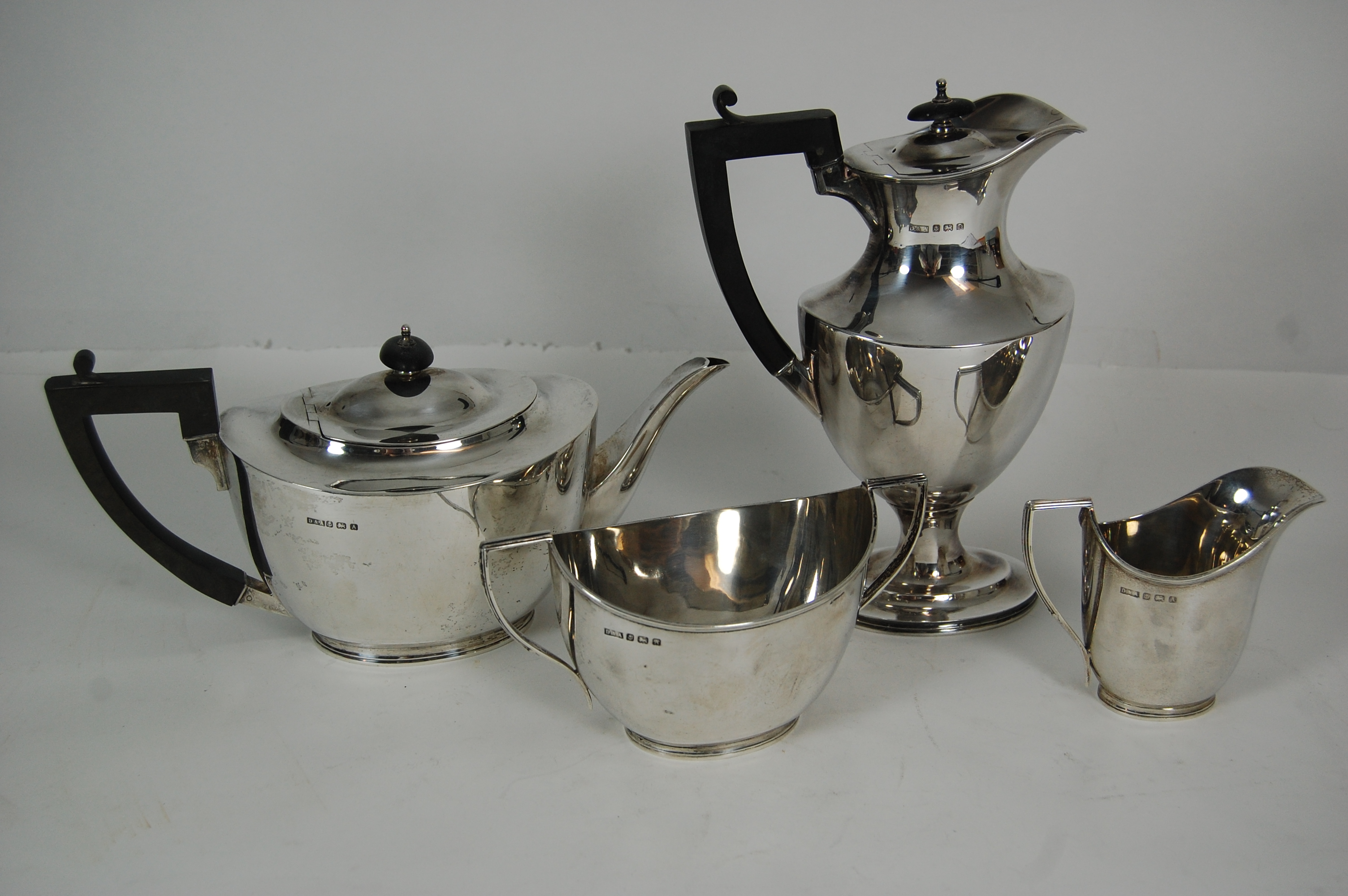 A matched four piece tea service
