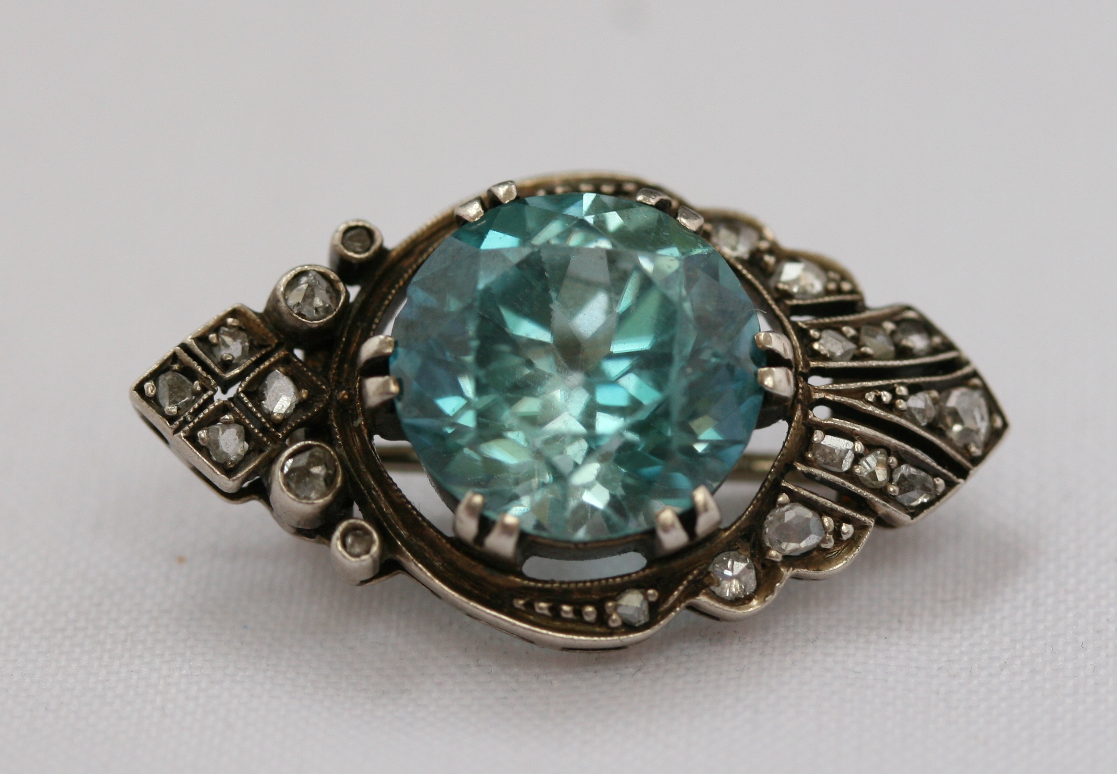 A zircon and diamond brooch