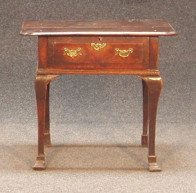 An early 18th century oak side table,
