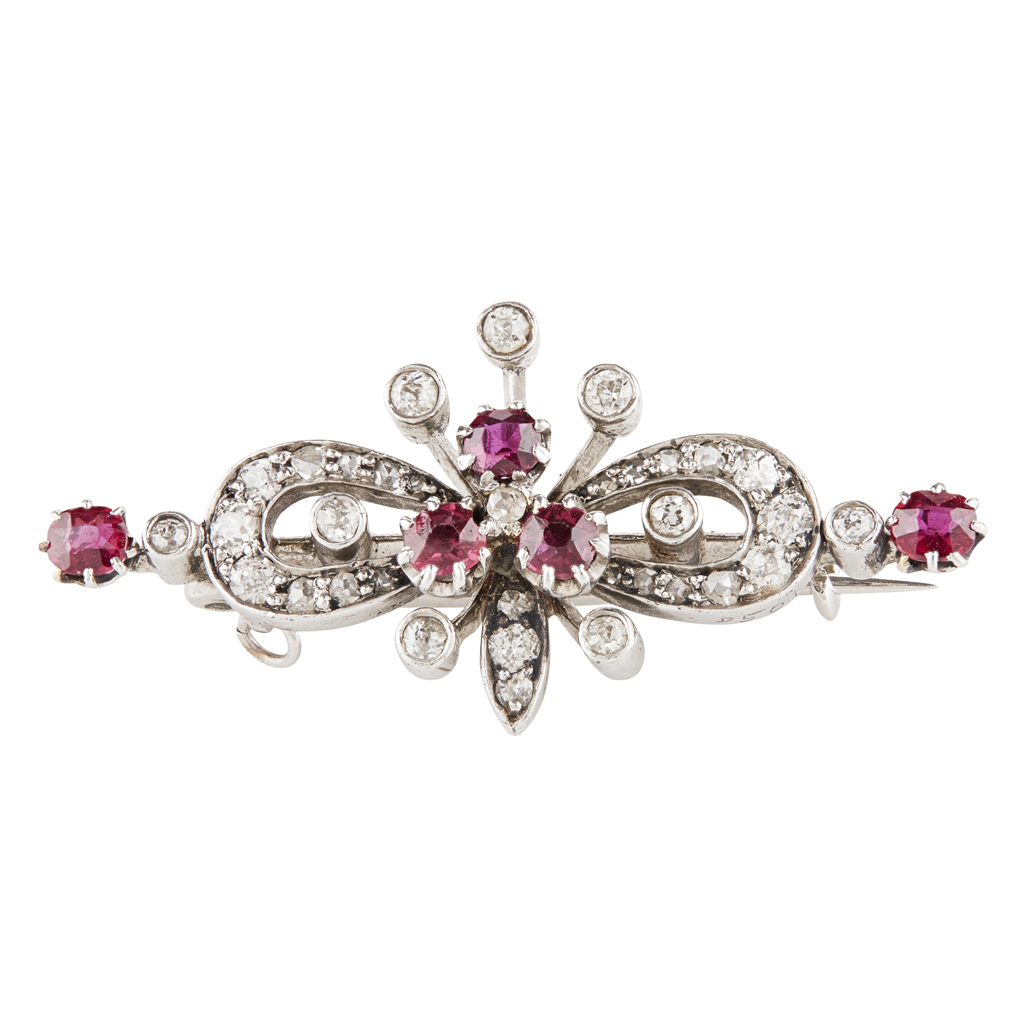 An Edwardian ruby and diamond set brooch