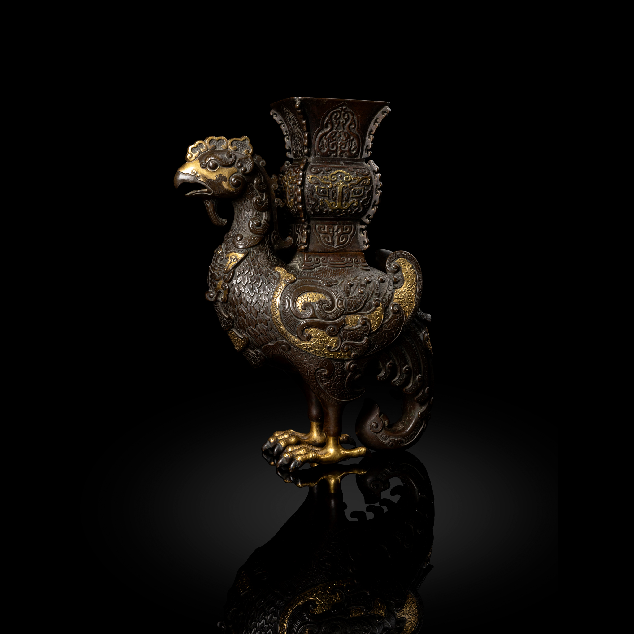 RARE PARCEL-GILT-BRONZE ARCHAISTIC 'HEAVENLY-ROOSTER' RITUAL VESSEL, ZUN