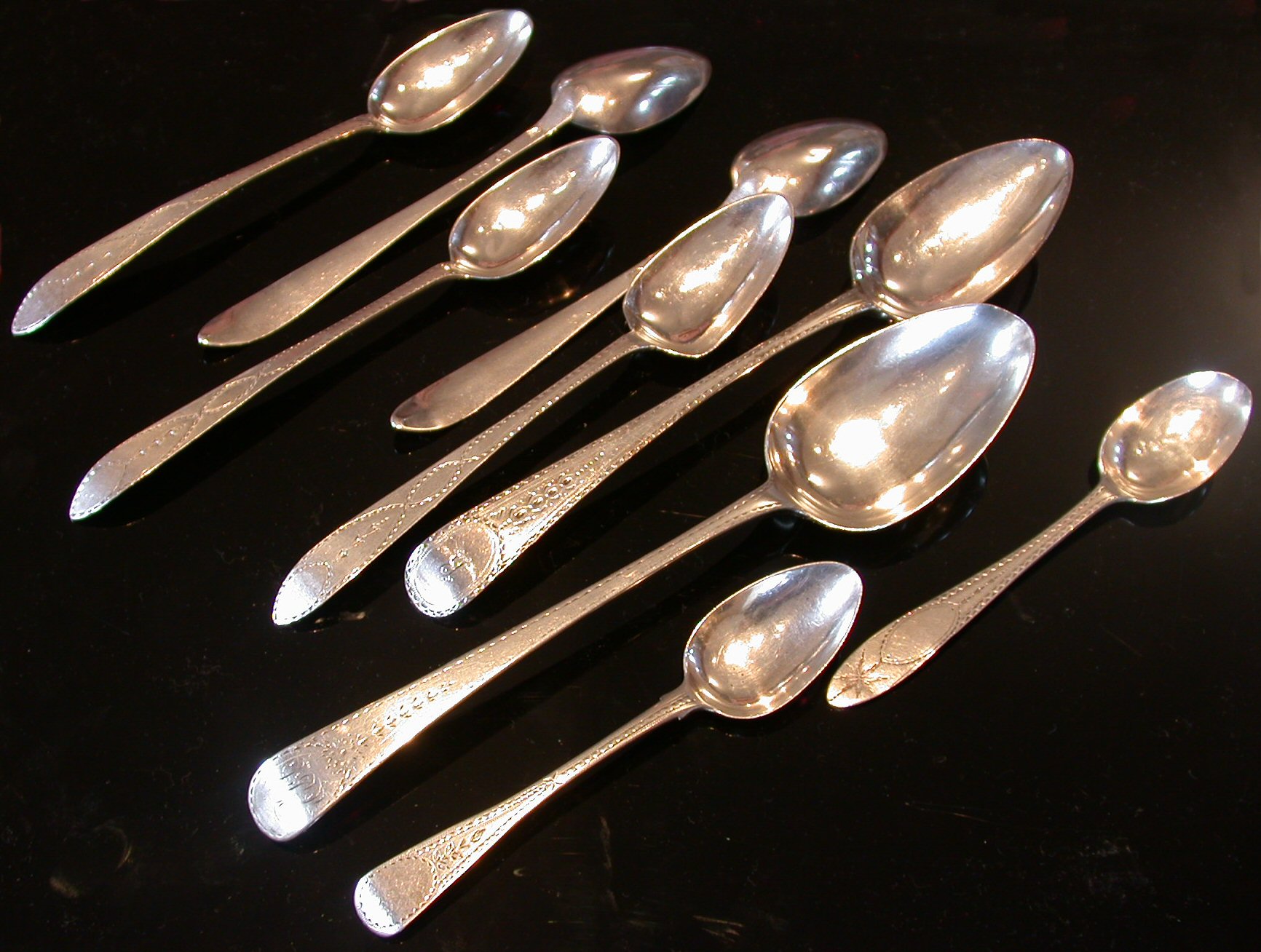 A part set of five Irish dessert spoons,