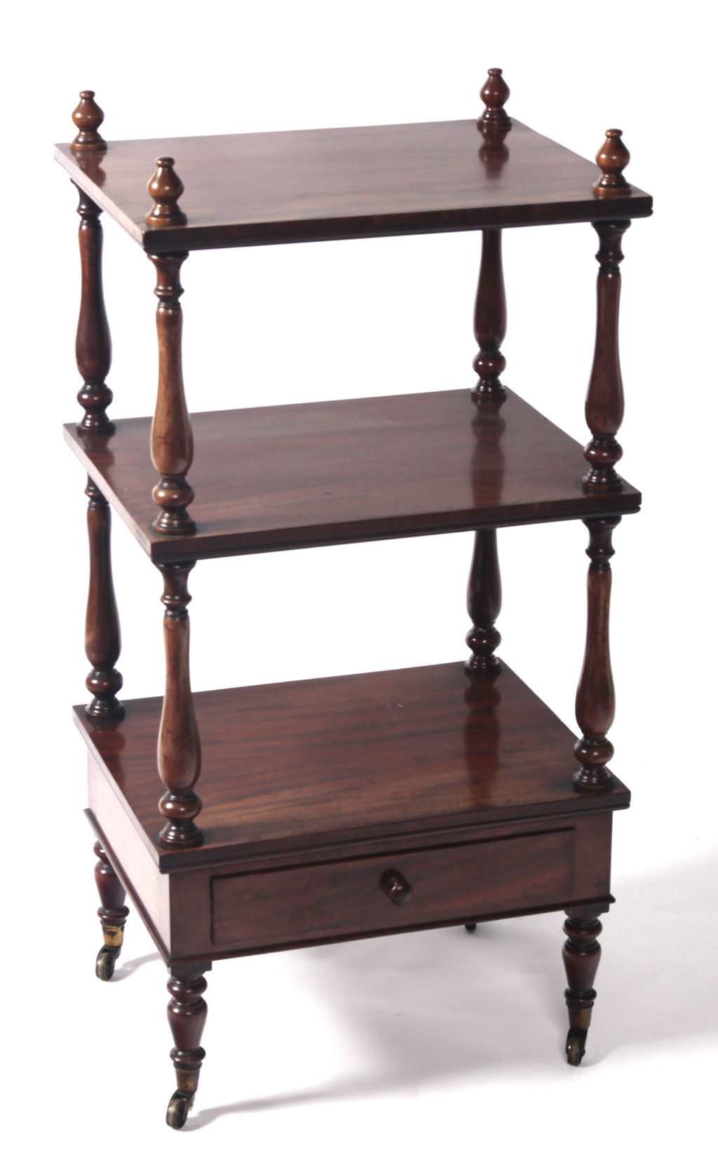 A Regency mahogany three-tier whatnot
