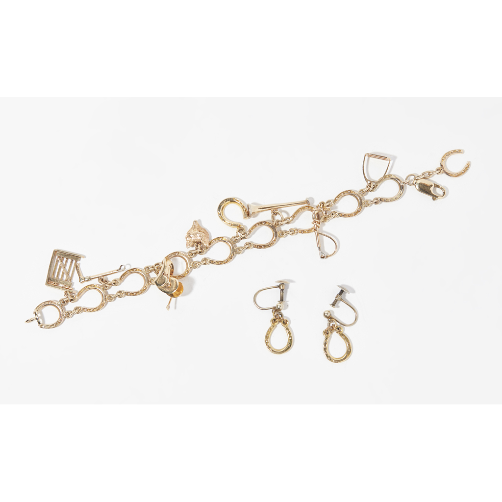 A 9ct gold charm bracelet and matching earrings