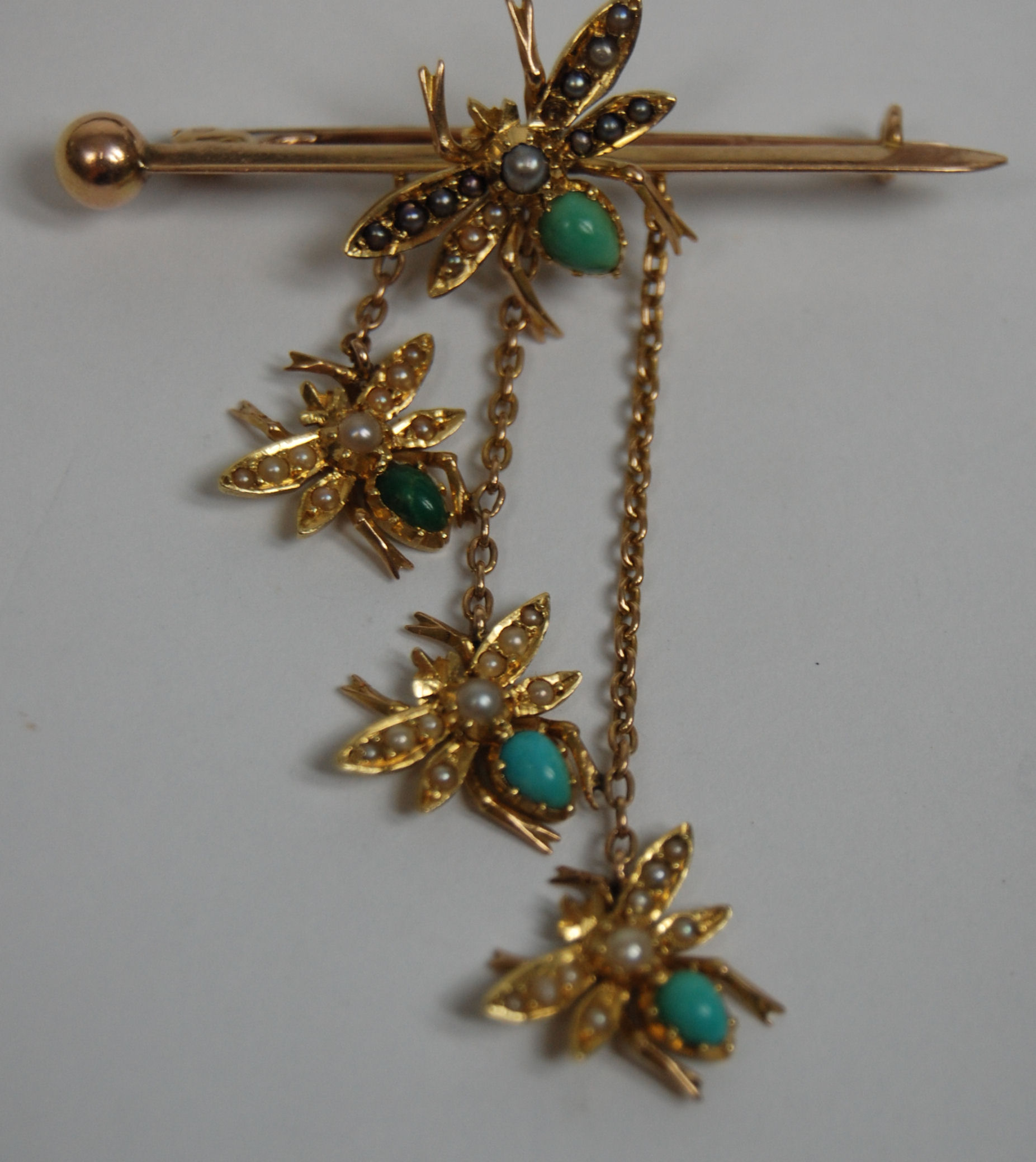 An Edwardian multi-gem set bar brooch