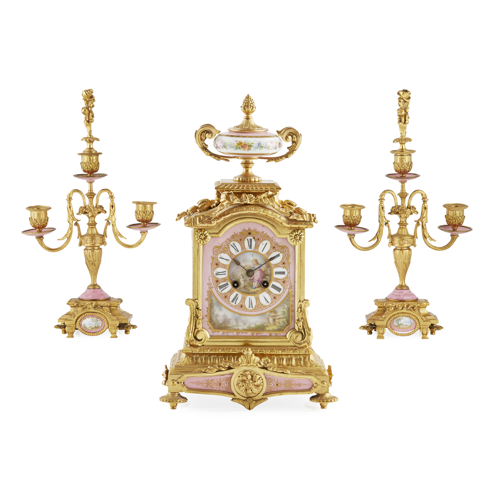 FRENCH PINK PORCELAIN AND GILT BRONZE CLOCK GARNITURE BY LEROY & FILS