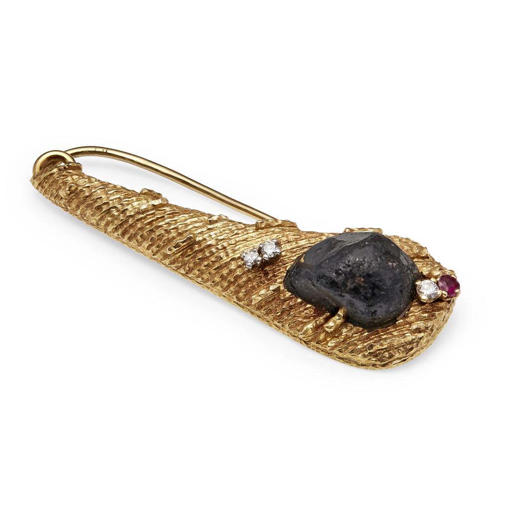 GRIMA - A modernist 18ct gold and garnet set brooch, circa 1986