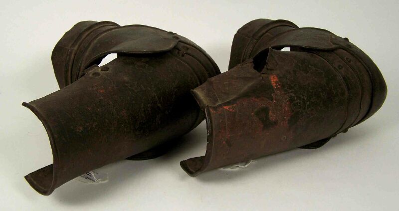 A pair of 17th century  German cuirassier's patinated iron vambraces