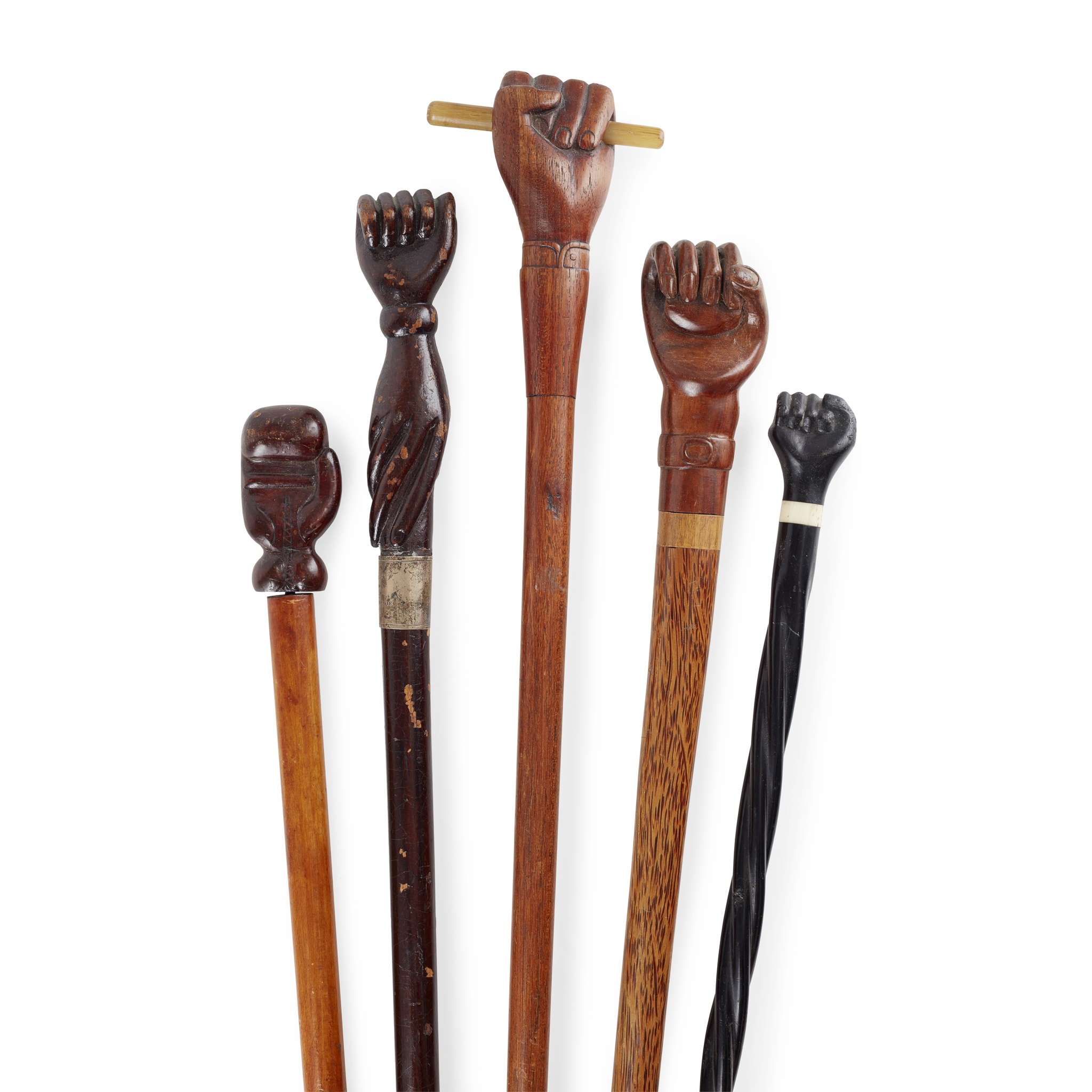 FIVE FOLK ART NOVELTY CARVED HAND WALKING STICKS