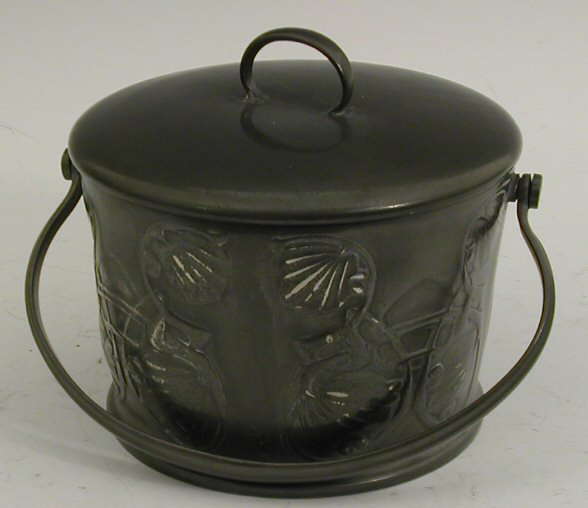 A Tudric pewter biscuit barrel and cover,