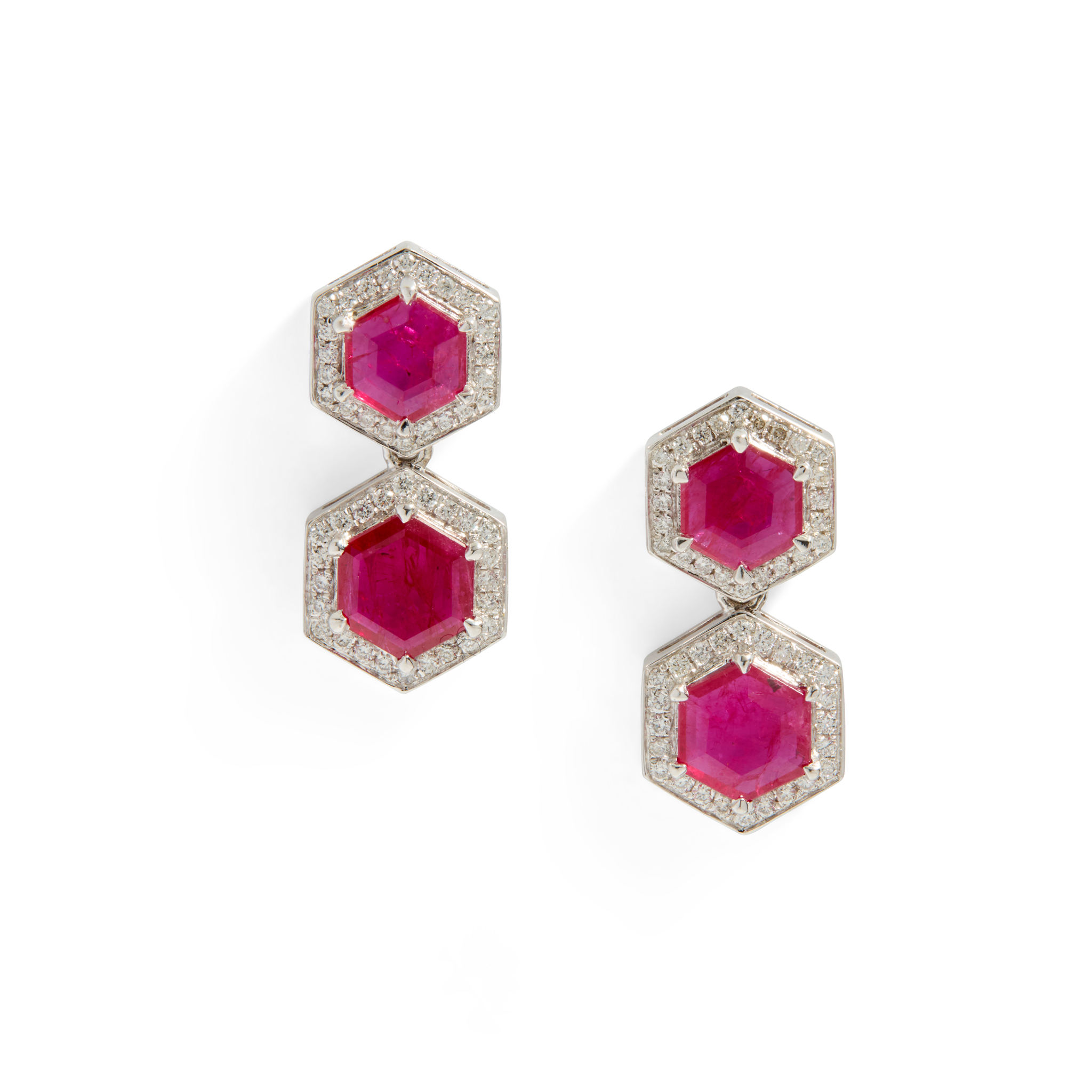 A pair of platinum ruby and diamond earrings