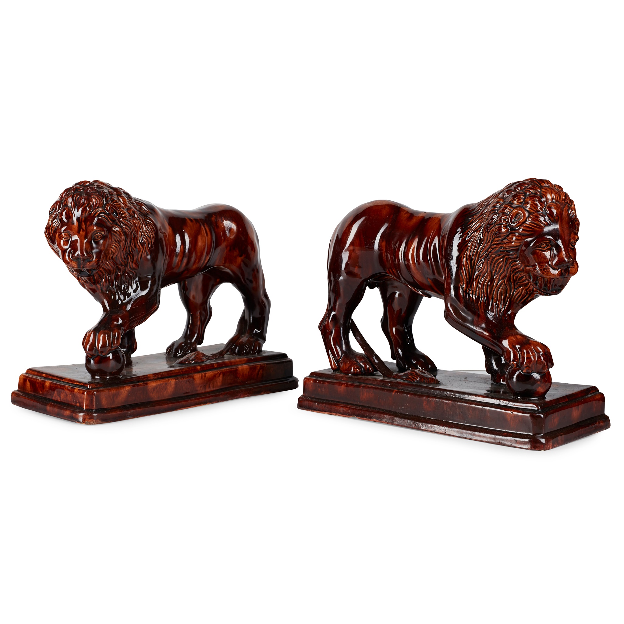 PAIR OF SCOTTISH TREACLE-GLAZED MEDICI LIONS