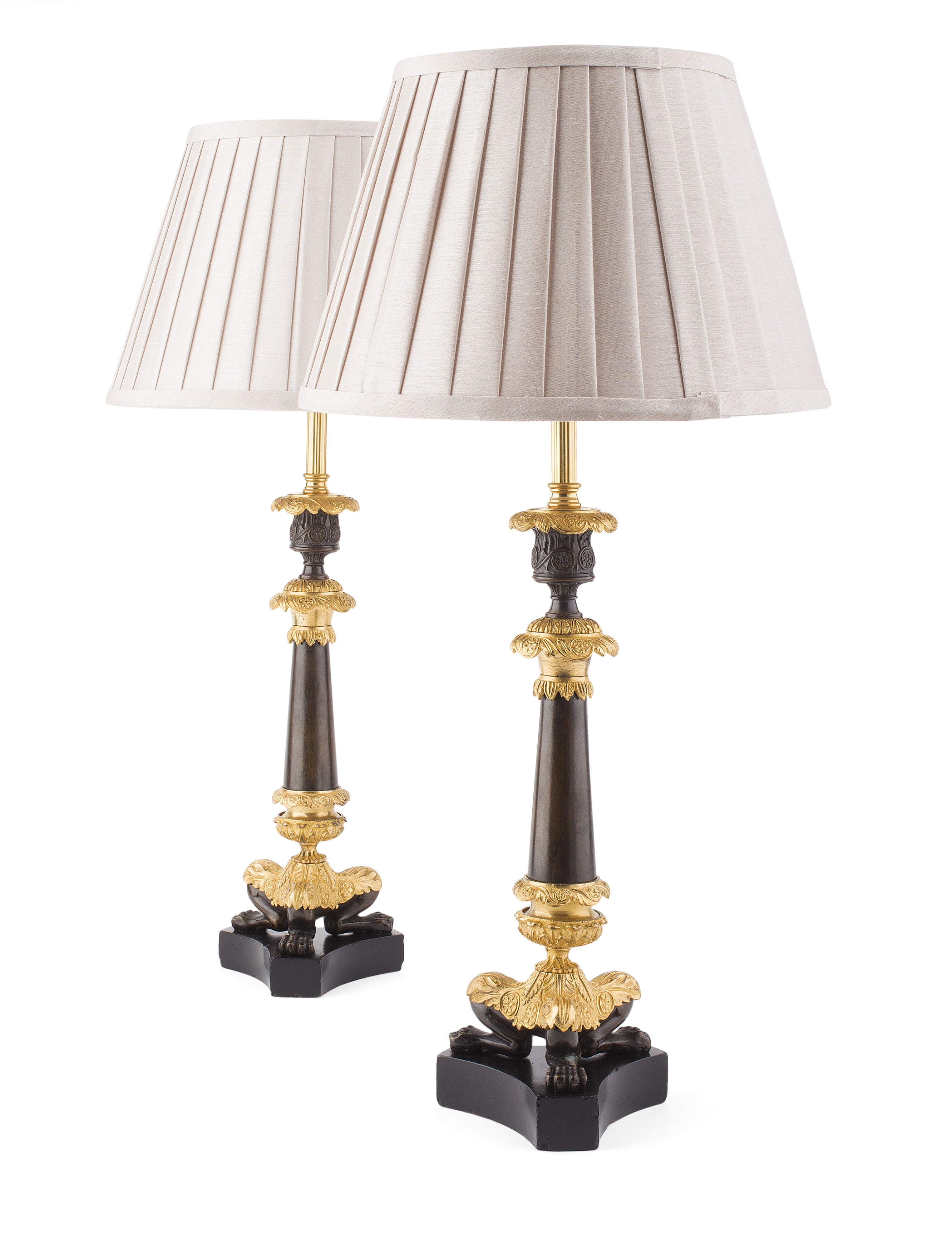 PAIR OF REGENCY PATINATED AND GILDED BRONZE LAMPS