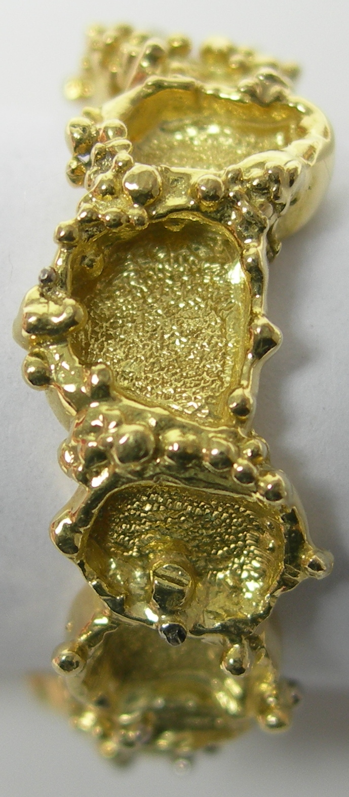 CHARLES DE TEMPLE - a 1970's 18ct gold ring,