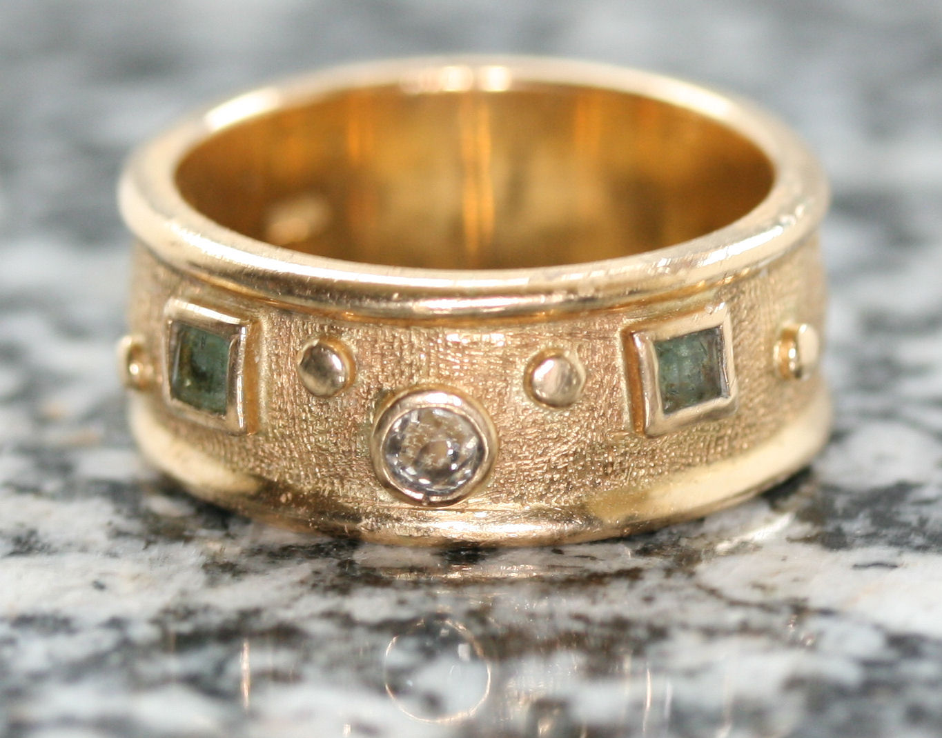 A multi-gem set ring and pendant with chain