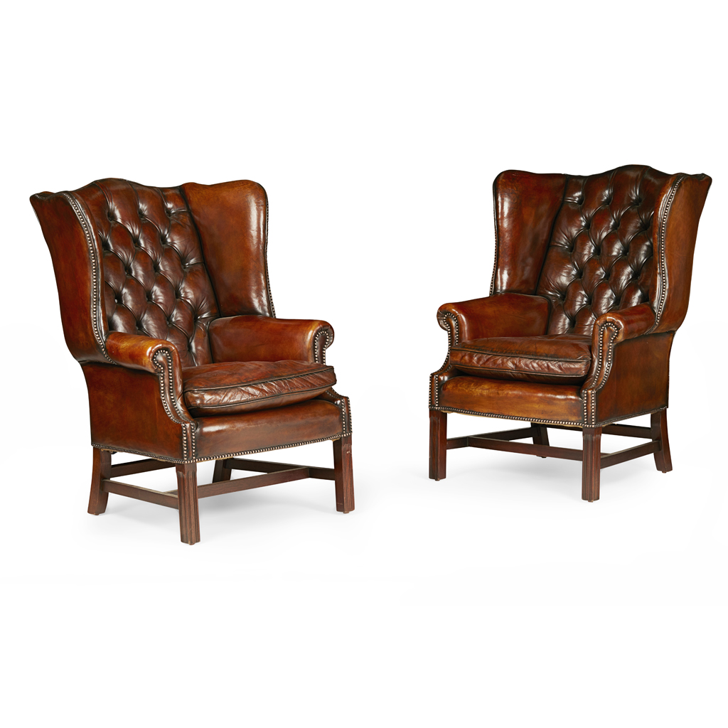PAIR OF GEORGIAN STYLE LEATHER WING ARMCHAIRS