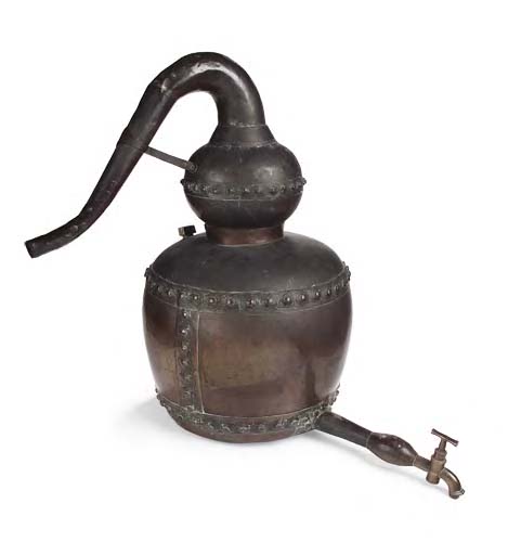 A 19th century copper model of a whisky still,