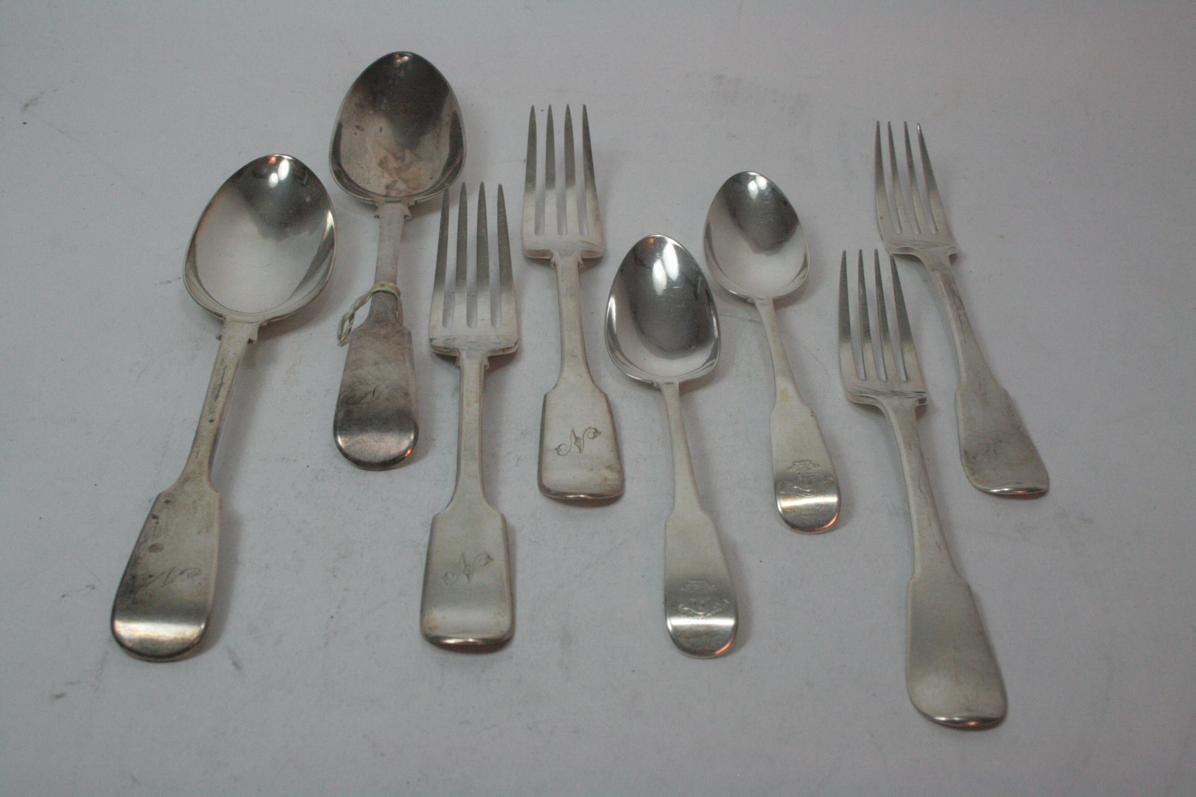 A collection of Fiddle pattern flatware