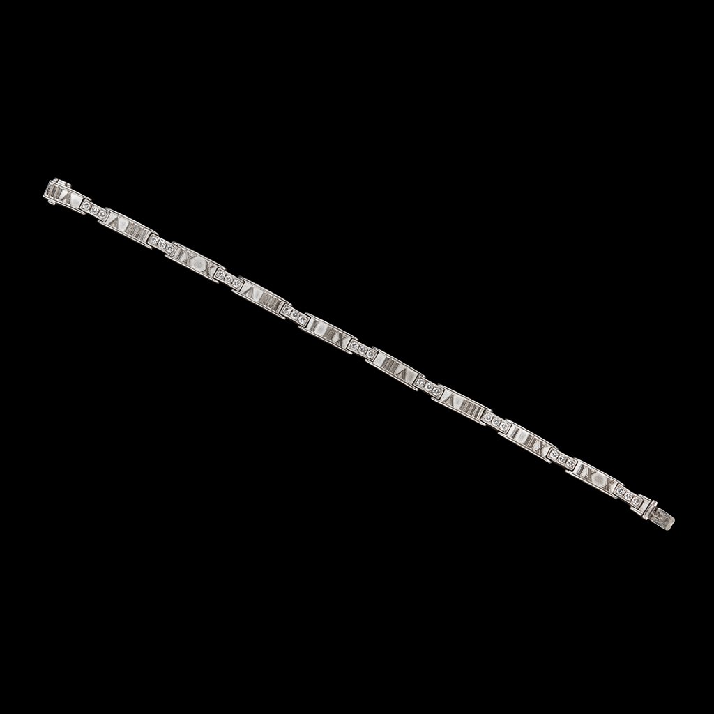 TIFFANY - An 18ct gold diamond set bracelet