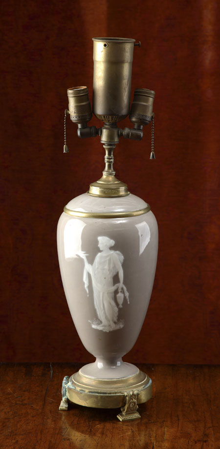 A giltmetal and porcelain lampbase