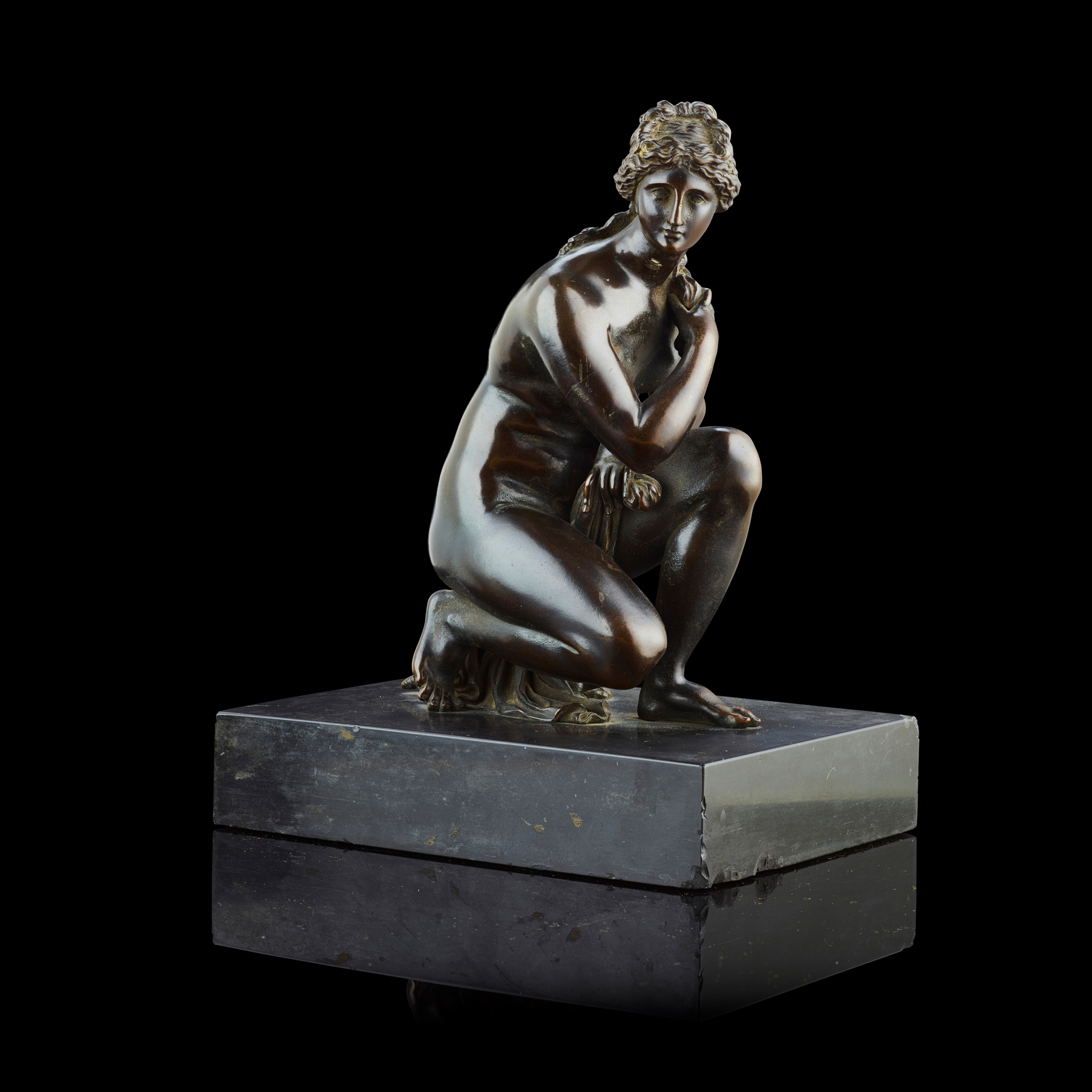 A FRENCH BRONZE FIGURE OF THE CROUCHING VENUS, AFTER ANTOINE COYSEVOX