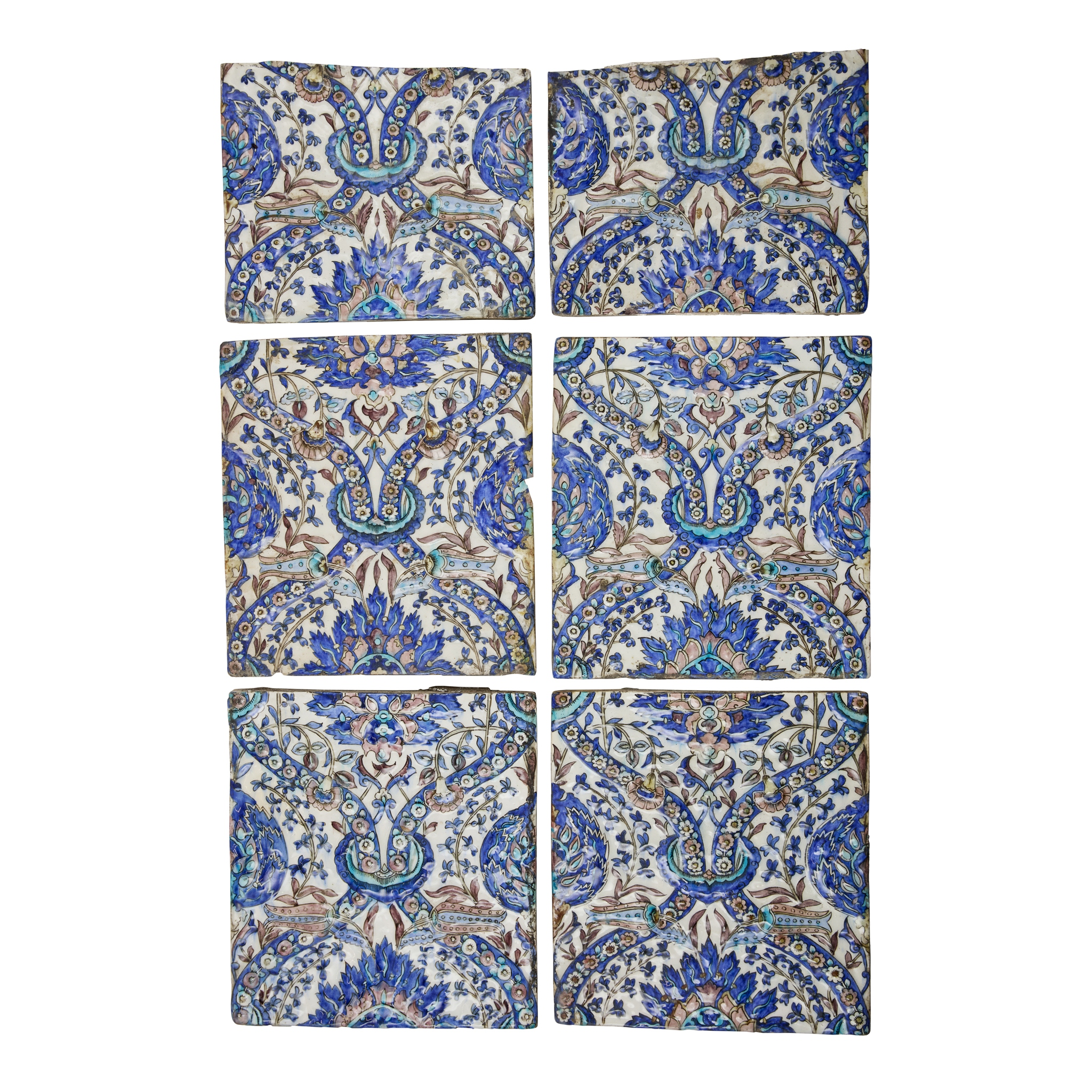 A GROUP OF SIX QAJAR MOULDED POTTERY TILES