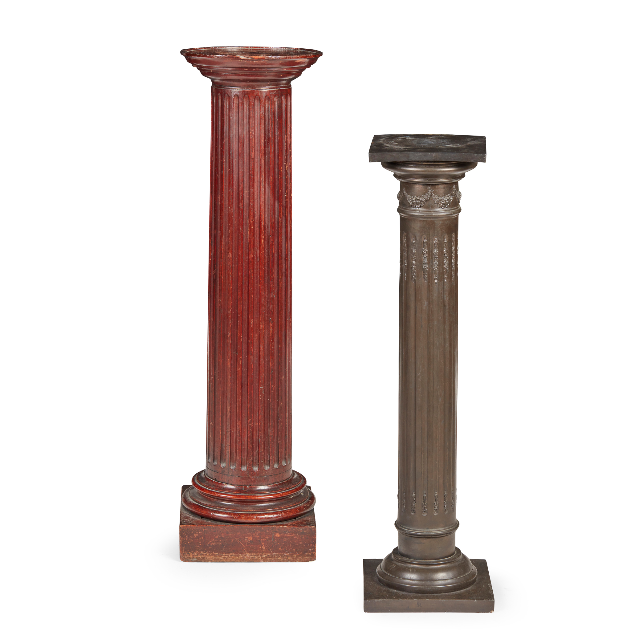 AN EBONISED WOOD AND METAL PEDESTAL COLUMN