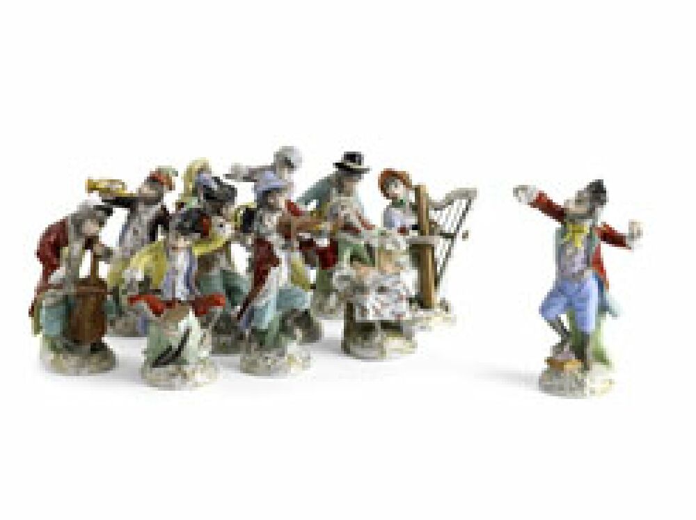 A set of twelve early 20th century Dresden monkey band figures After the 18th century Meissen models by J.J.Kandler