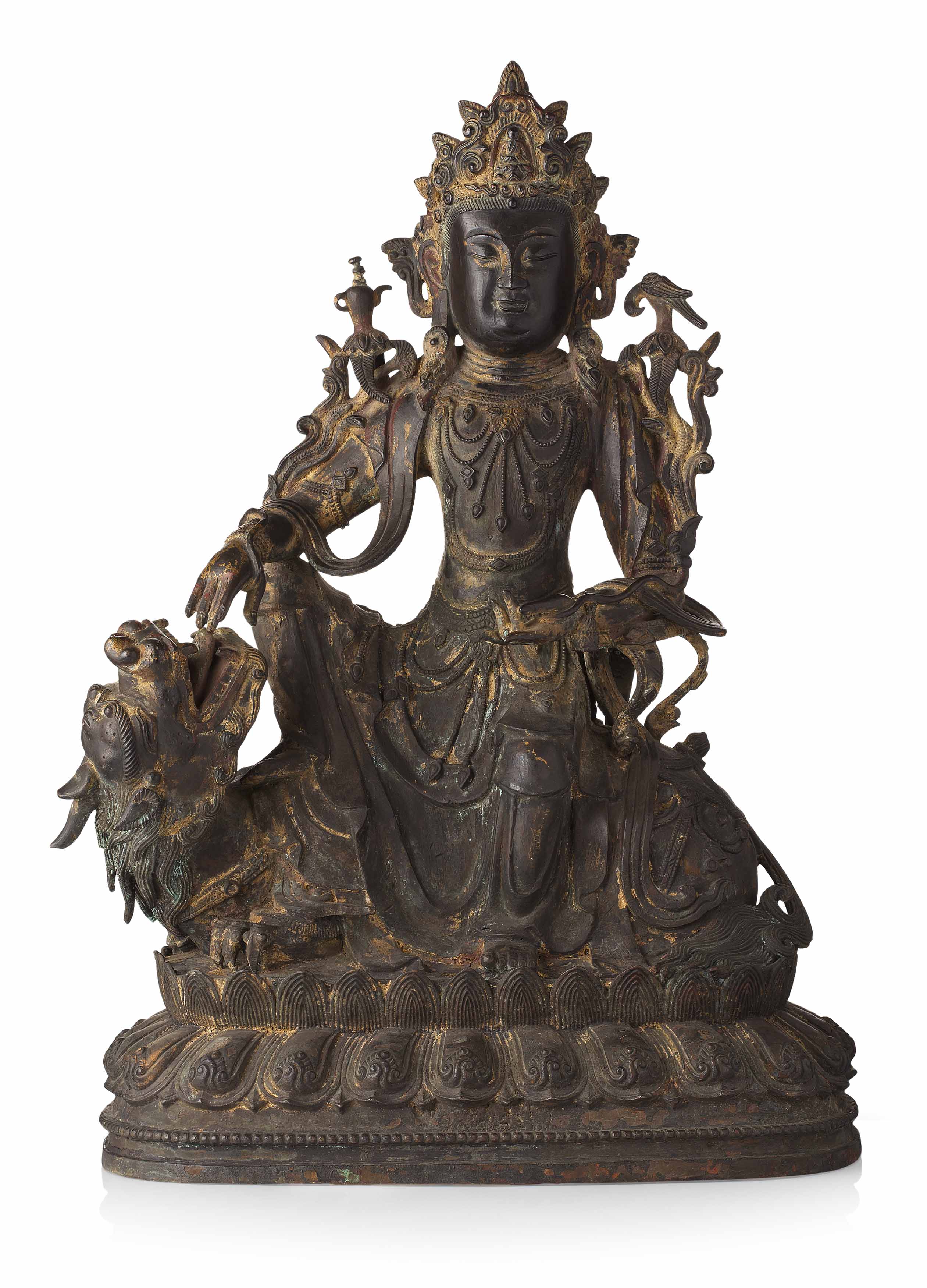 BRONZE FIGURE OF AVALOKITESHVARA SEATED ON A MYTHICAL BEAST