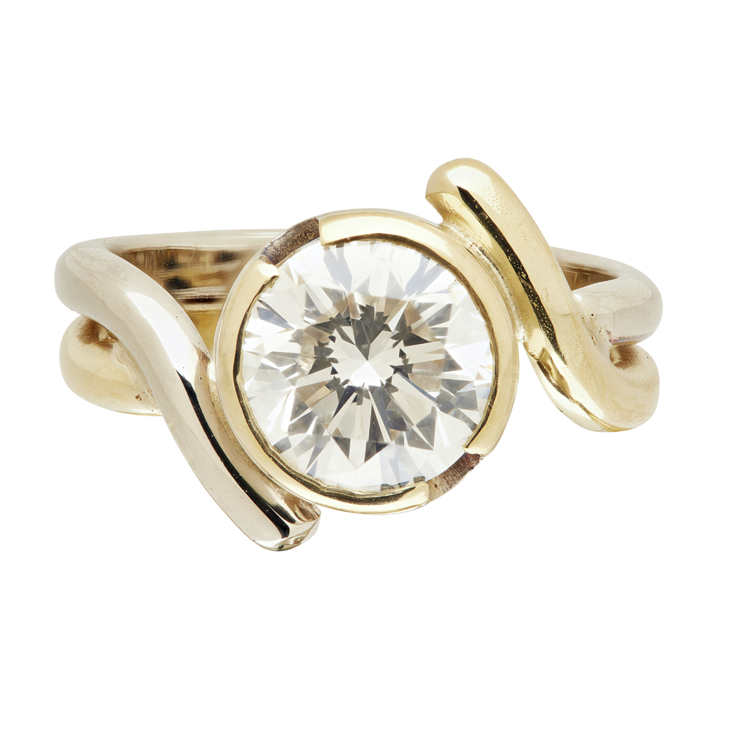 A modern single stone diamond ring