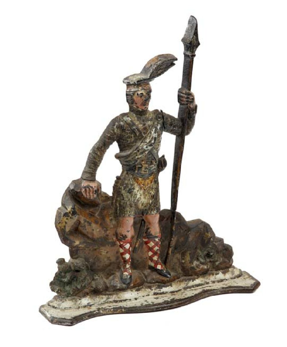 A late Victorian period painted cast iron doorstop