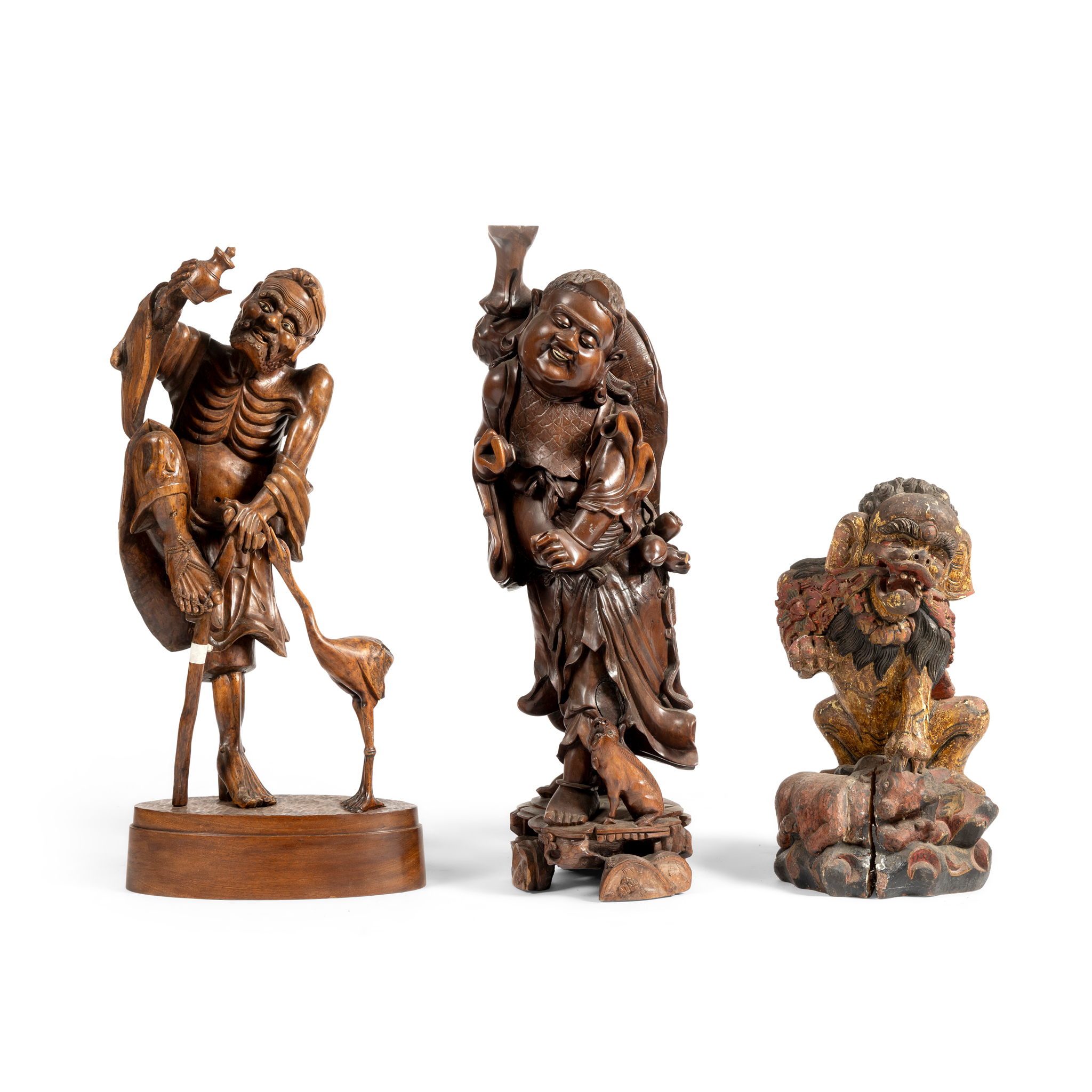 THREE CARVED HARDWOOD FIGURES