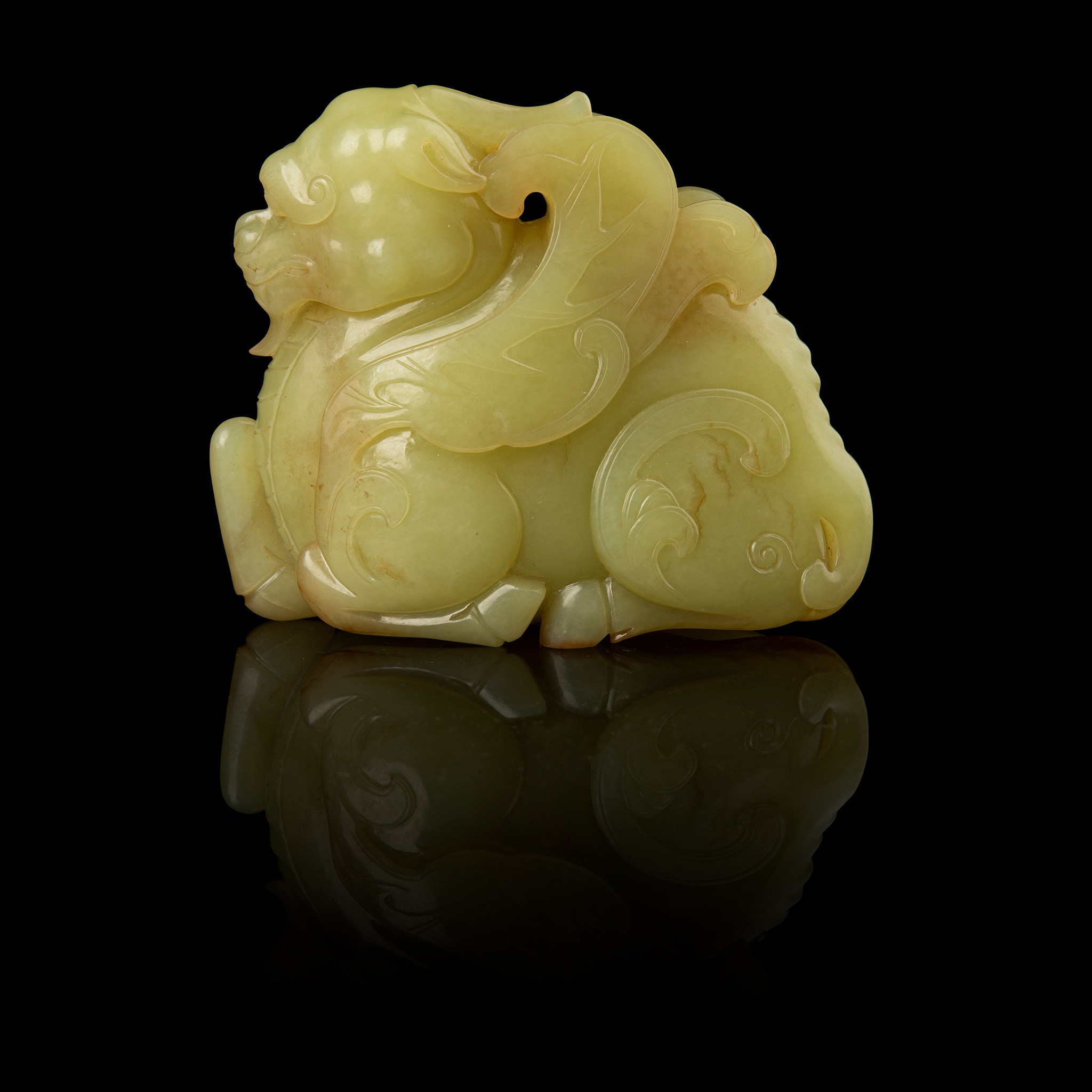YELLOW JADE CARVING OF A QILIN
