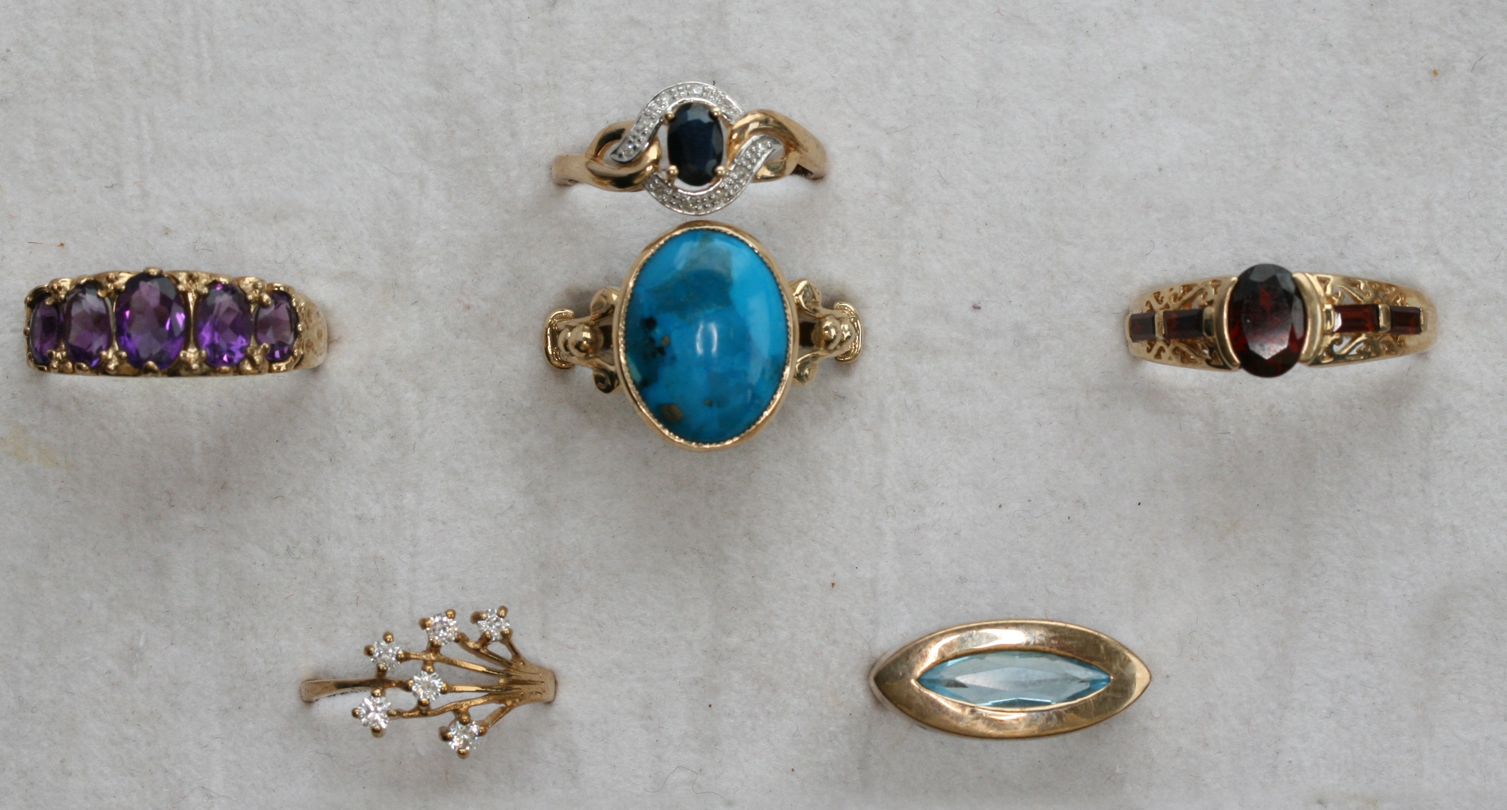 A group of six various diamond and gem set rings