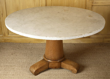 A 19th century French marble topped elm centre table