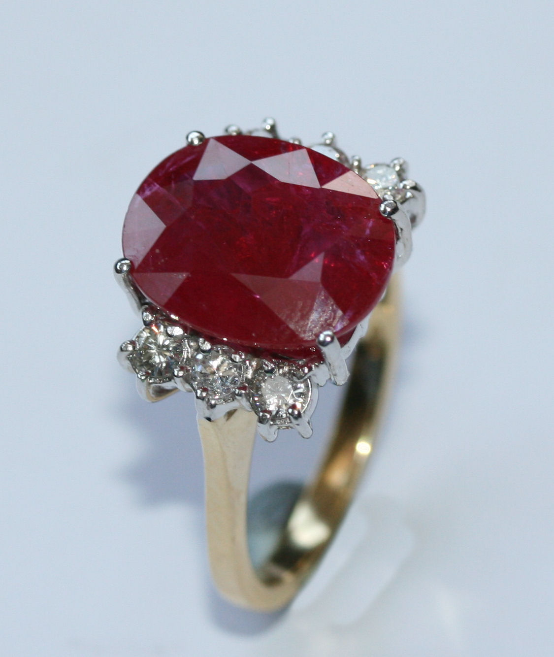 An 18ct gold mounted ruby and diamond set ring