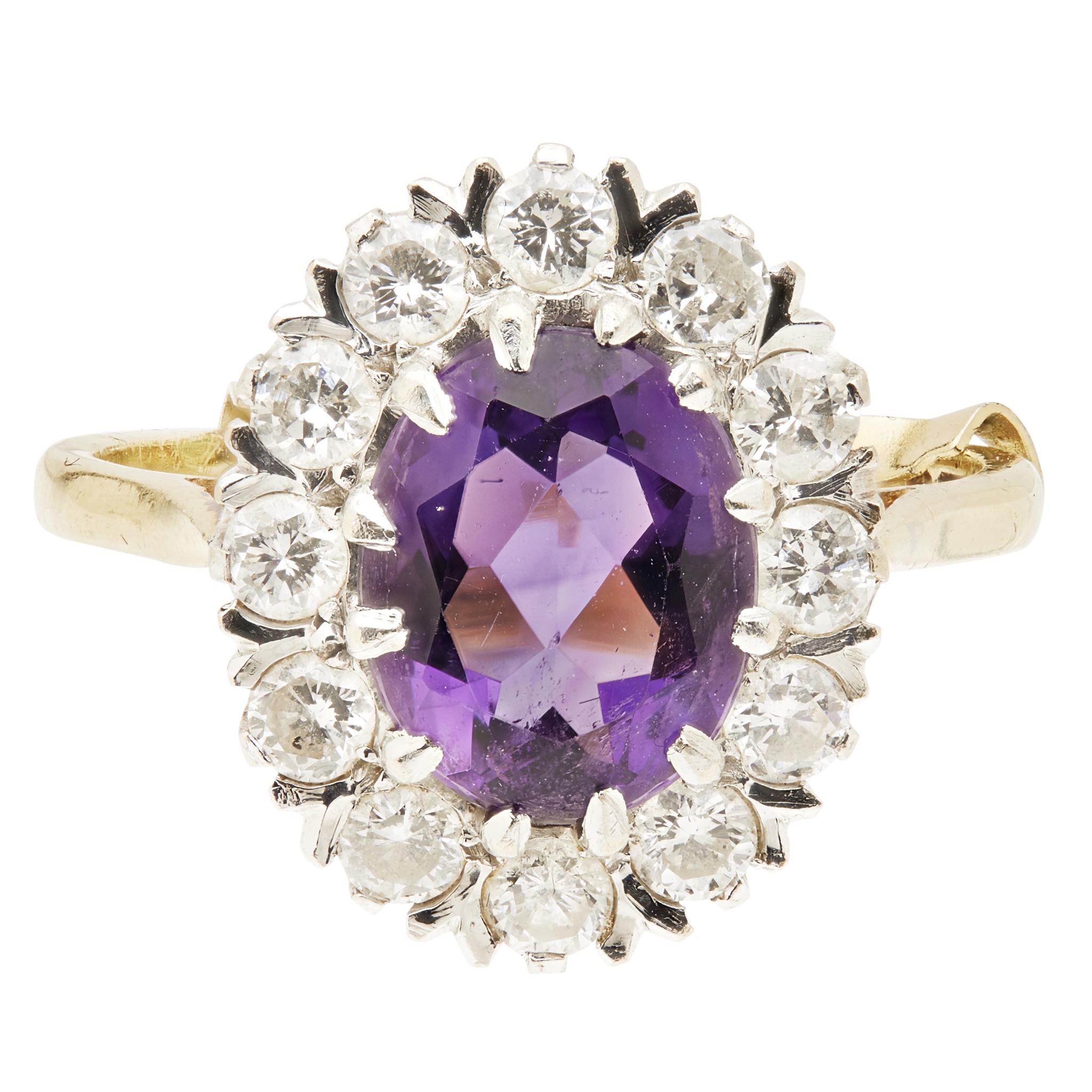 An amethyst and diamond set cluster ring