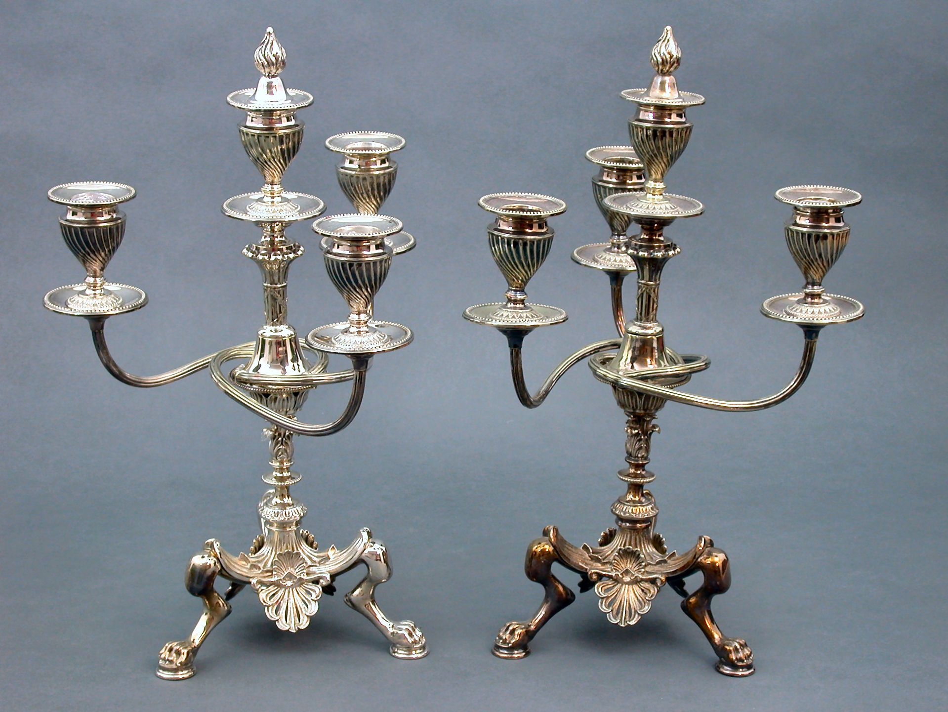 A pair of plated four-light candelabra,