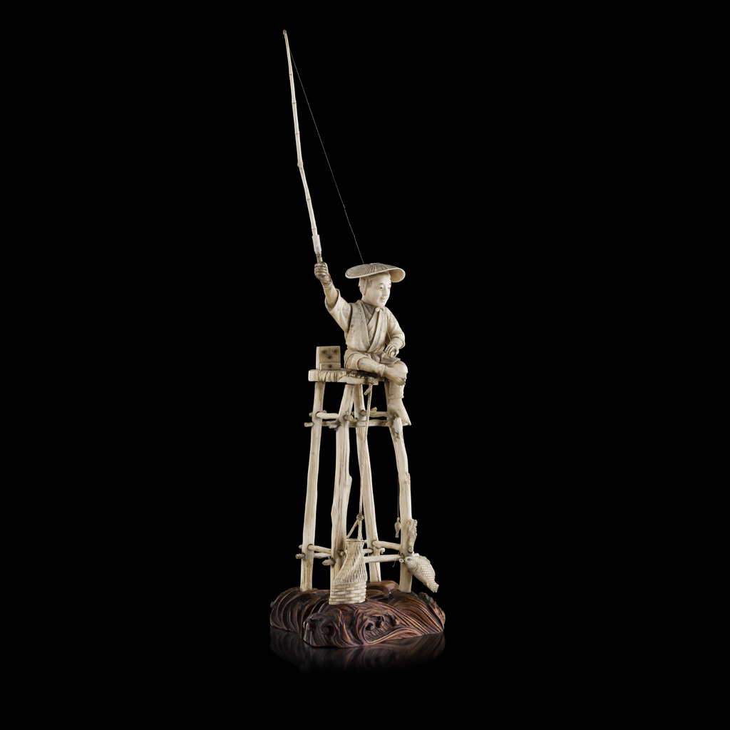 IVORY OKIMONO OF A FISHERMAN