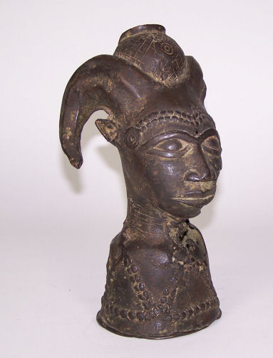 A Benin bronze ram's horn fertility figure