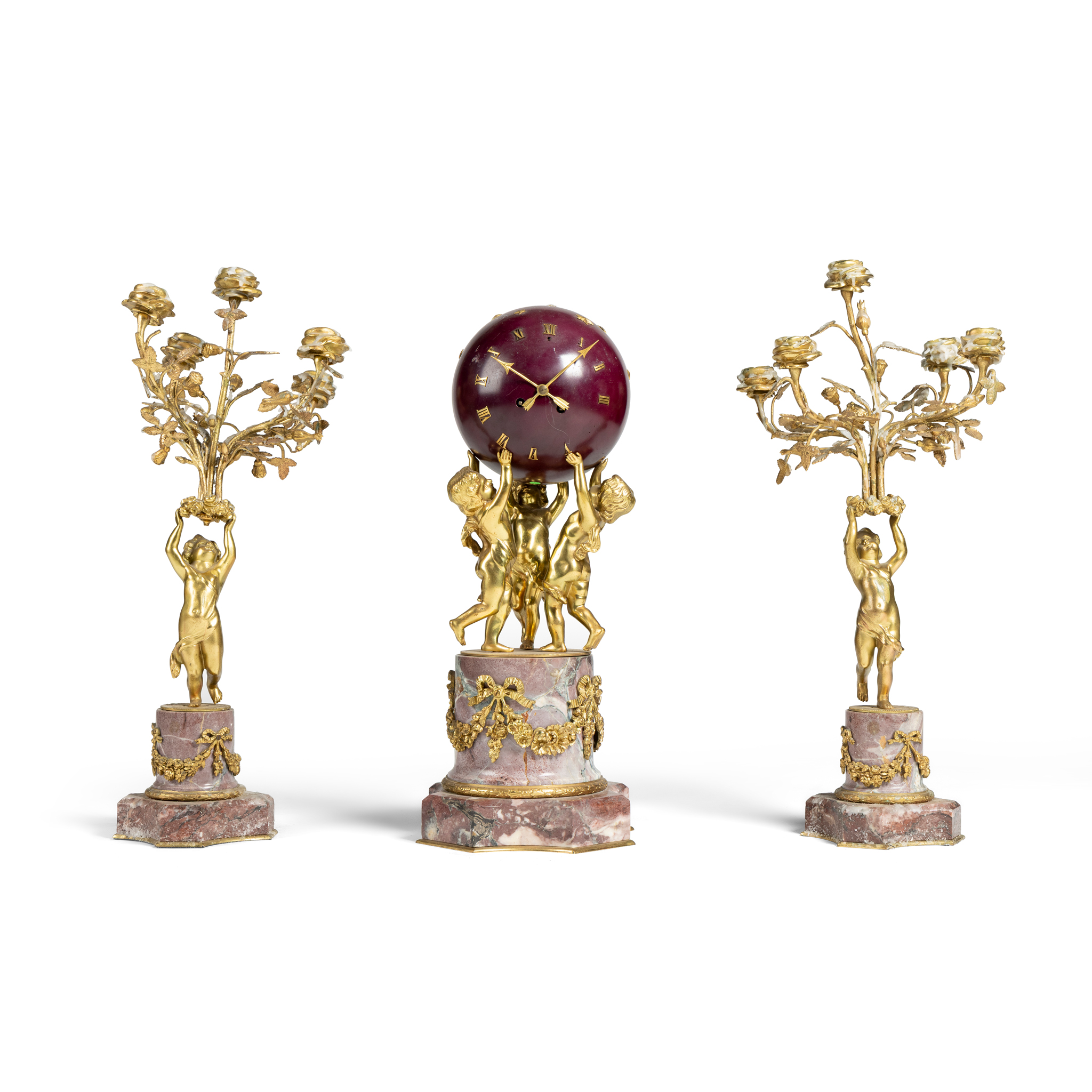 A FRENCH GILT METAL AND MARBLE CLOCK GARNITURE