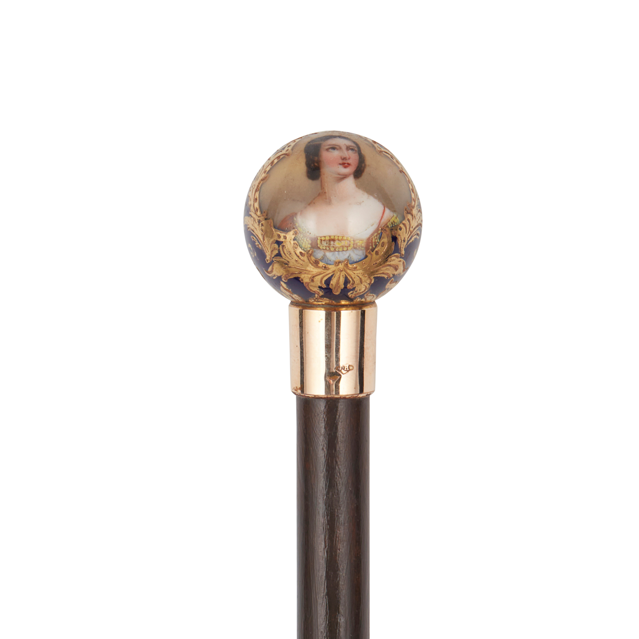 Queen Victoria interest - a gold and porcelain mounted hardwood cane