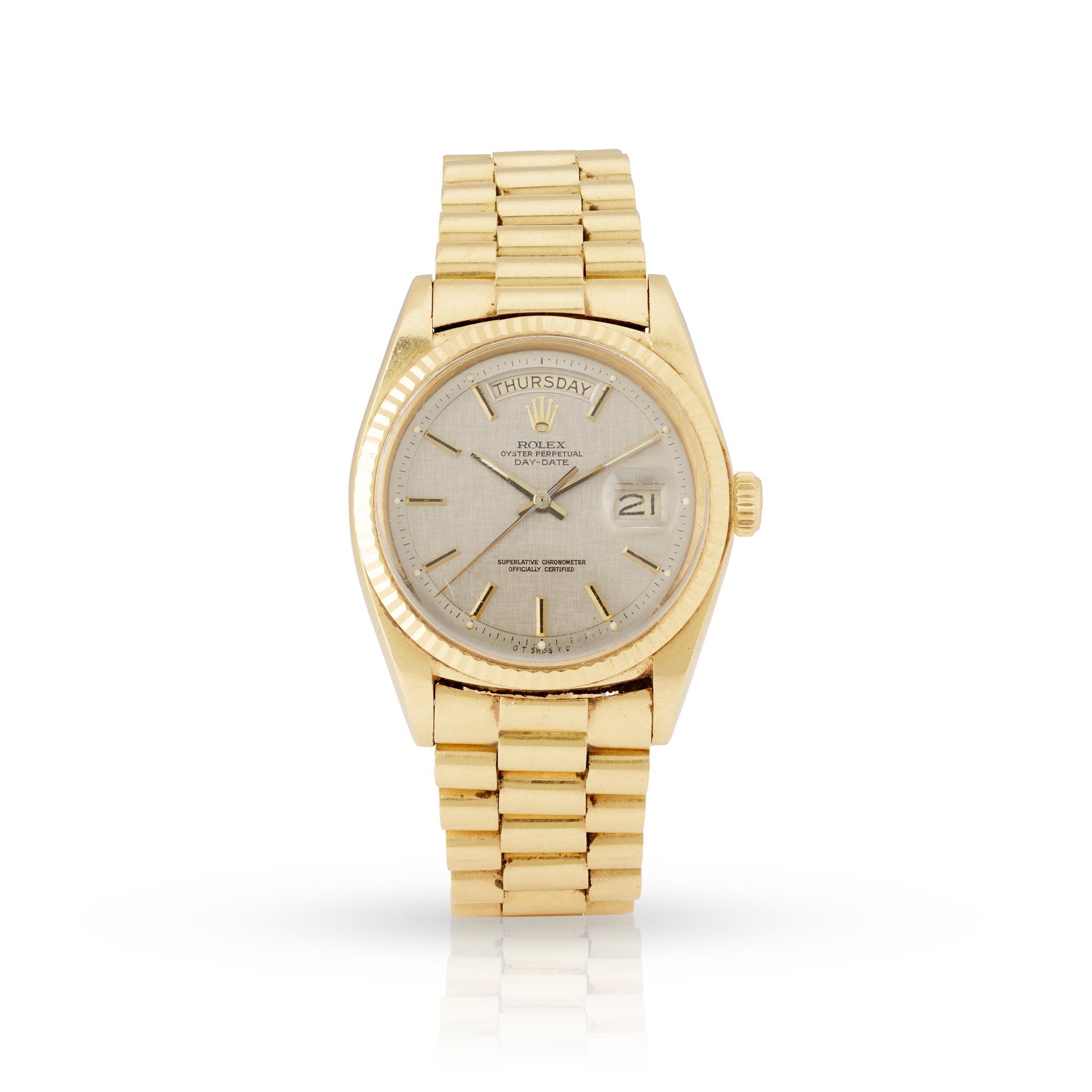 Rolex. A fine and rare 18k yellow gold self-winding day-date wristwatch on bracelet