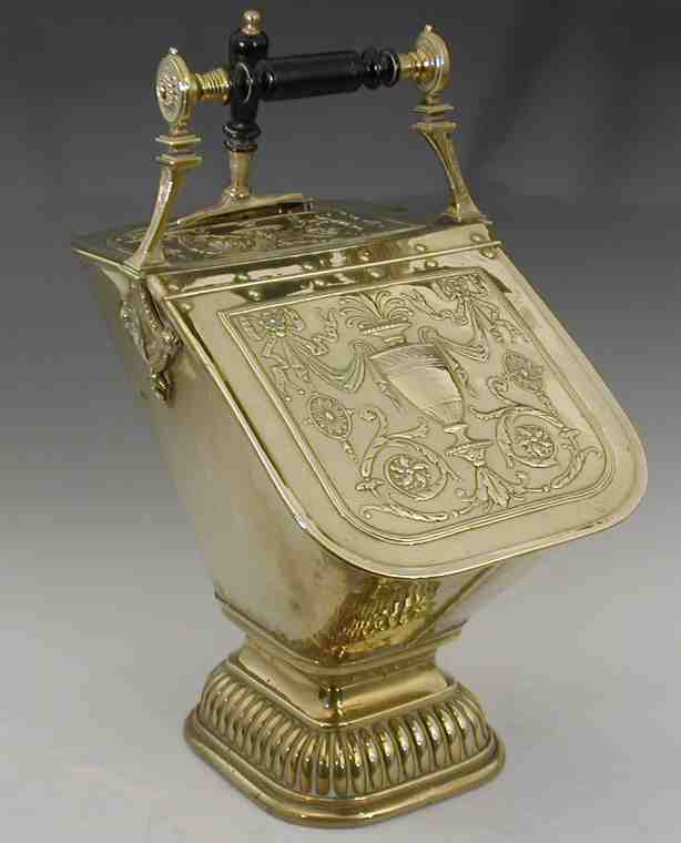 An Edwardian brass coal helmet,