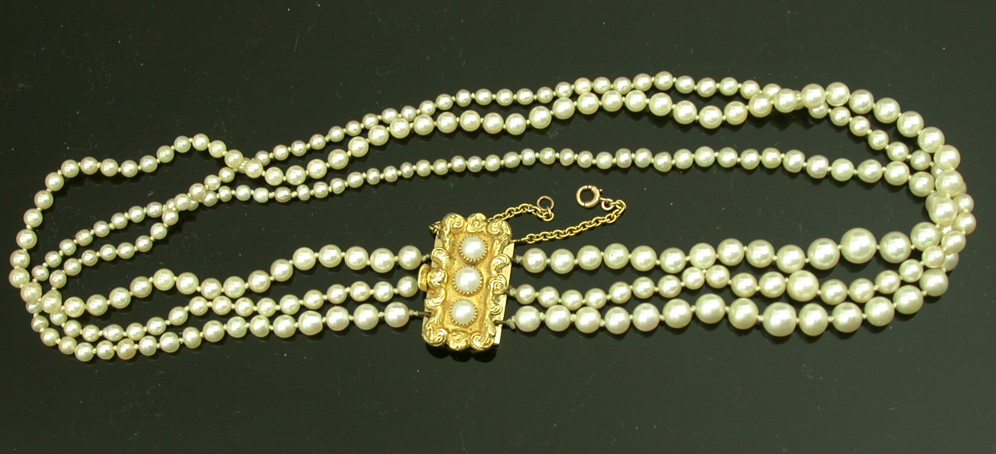 A cultured pearl three row necklace,