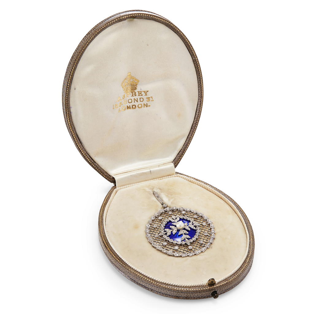 An early 20th century diamond, pearl and enamel set pendant