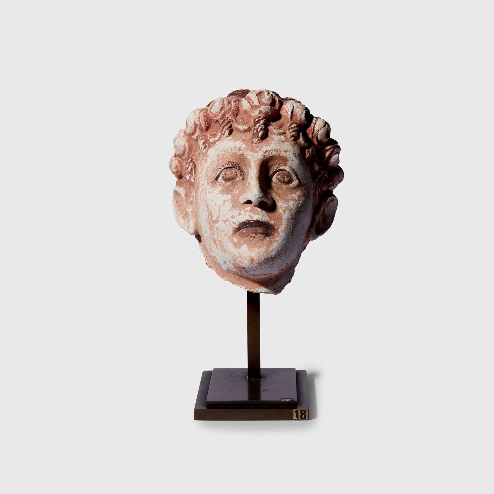 ROMANO-EGYPTIAN TERRACOTTA HEAD