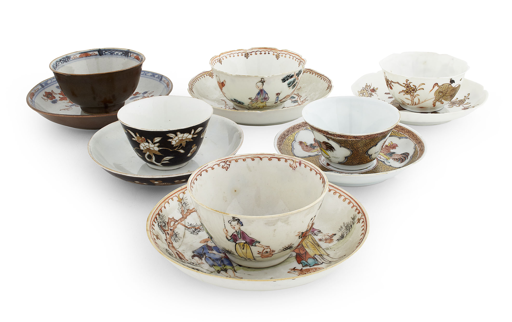 GROUP OF SIX CHINESE PORCELAIN TEA BOWLS AND SAUCERS