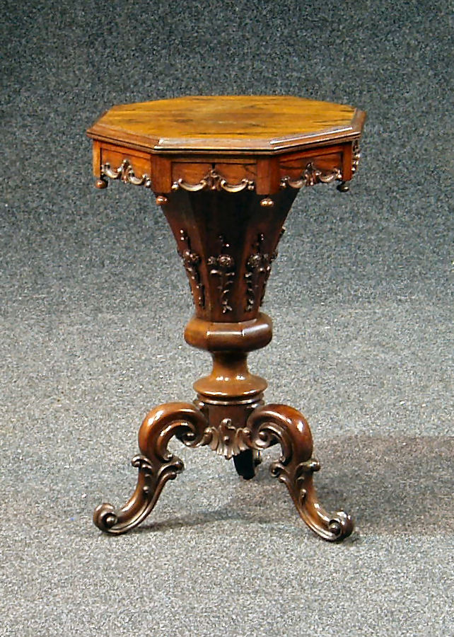 A Victorian rosewood work table,